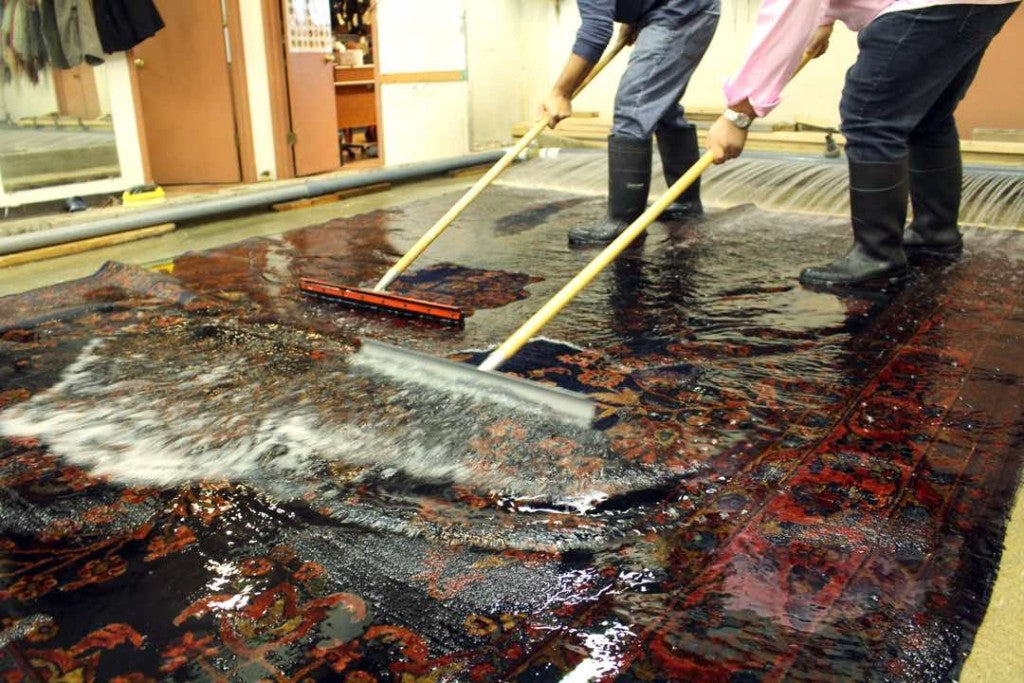 Rug hand-washing in workshop